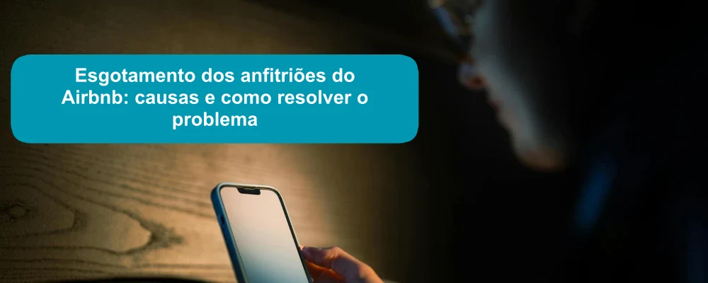 O anfitrião a ver o telemóvel à noite